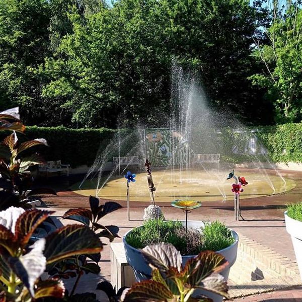 splash play park with outdoor musical flowers