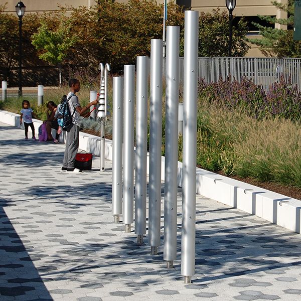 Silver outdoor musical chimes on the plaza outside White Plains Public Library NY 