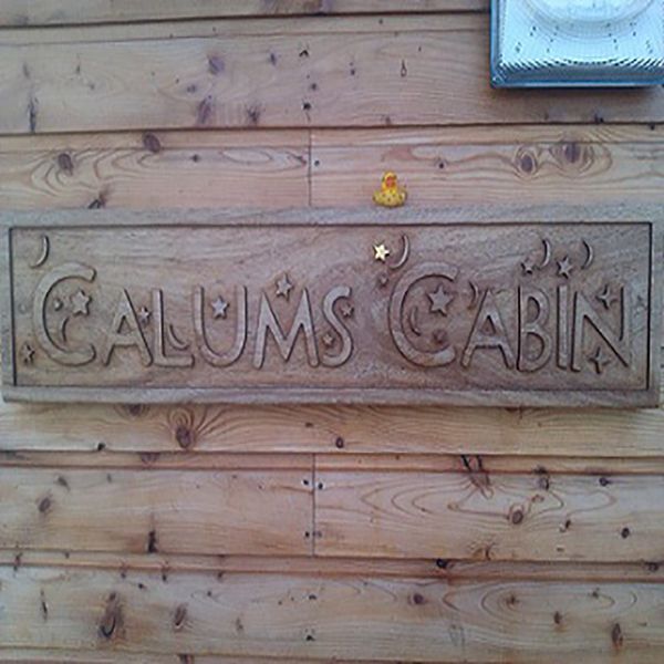 Sign hanging on Calums Cabin Isle of Bute