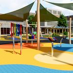 A vibrant playground with colorful, musical play structures and shade sails. Bright circles on the ground, surrounded by buildings and trees, create a lively atmosphere.