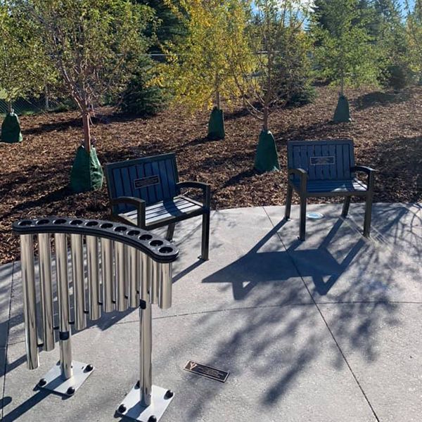 a set of musical pipes called Handpipes in the Quinterra legacy garden Calgary