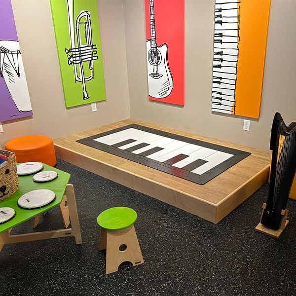 an interactive floor piano in the NAMM museum