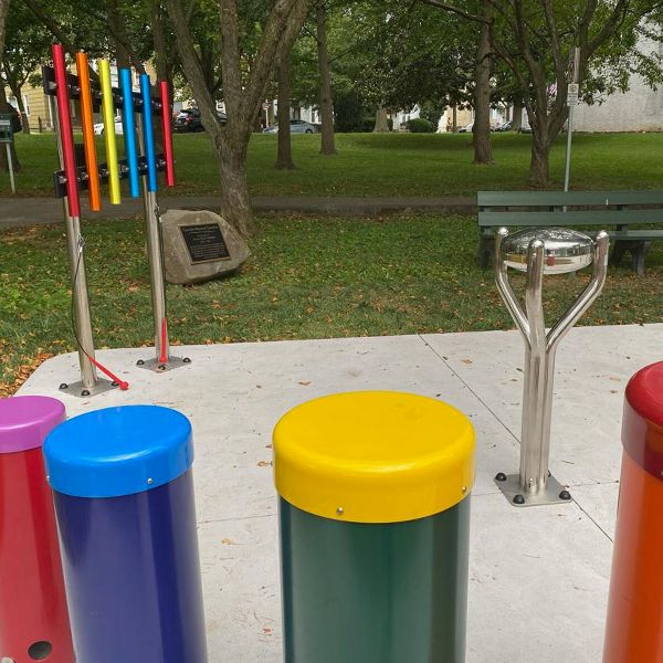 large colorful outdoor musical instruments in a memorial park dedicated to a young boy called Gavin