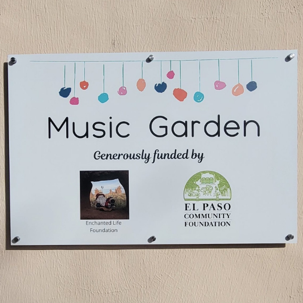 A sign welcoming patrons to the new music garden at the Play Sharity Children's Museum 