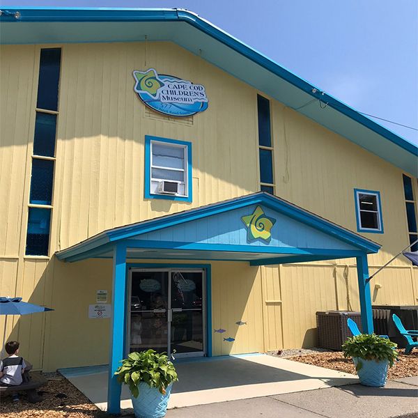 the front entrance to the cape cod children's museum which house a music room with drums