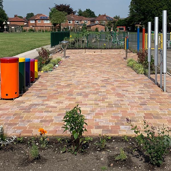 Outdoor Chimes and Drums in a Memorial Sensory Garden in a School Playground