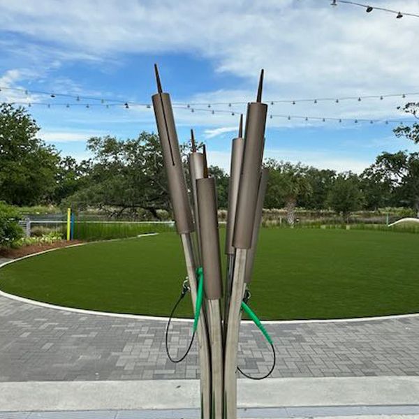 an outdoor musical instrument shaped like cattails at the Louisiana Children's Museum