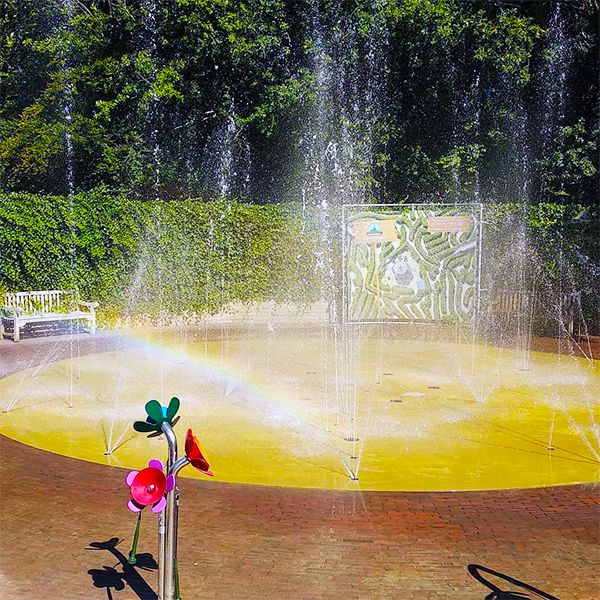 splash play park with outdoor musical flowers