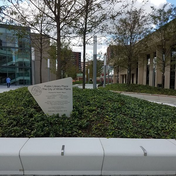 The sign out side the White plains Library brand new musical plaza