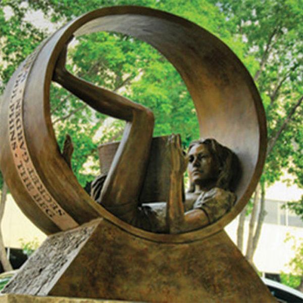 statue outside the north mankato taylor library music garden