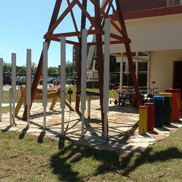 outdoor musical instruments in a sunny school playground