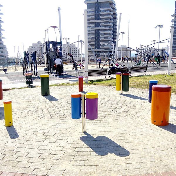 Colourful Outdoor Drums forming a drum circle on beach front playground in City of Ashdod