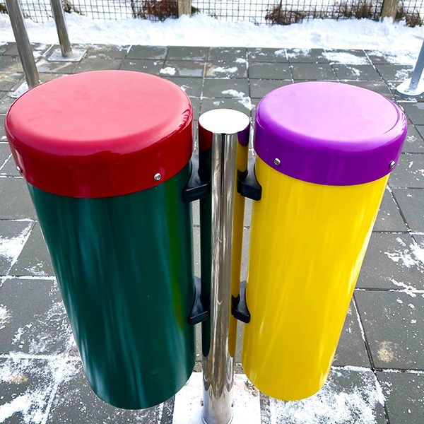 a pair of red and purple outdoor conga drums 