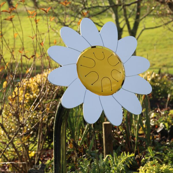 an outdoor musical drum in the shape and colours of a daisy