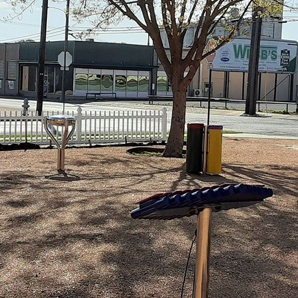 outdoor musical instruments including an outdoor drum and outdoor xylophone in the Sherman Library Harmony Garden