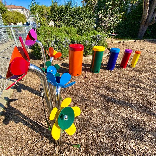 Bright Coloured Outdoor Musical Flowers and Drums in the Morgan Autism Center Musical Garden 