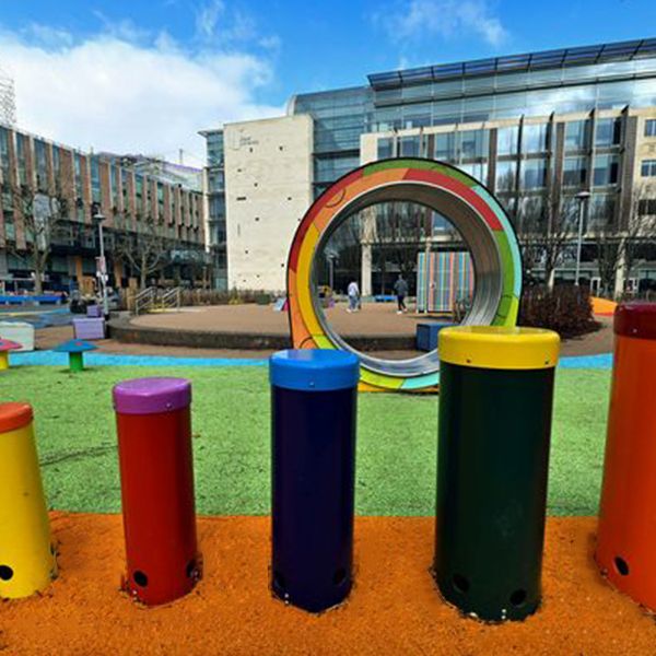 rainbow colored outdoor drums in the inclusive music park in cathedral gardens, Belfast, Northern Ireland