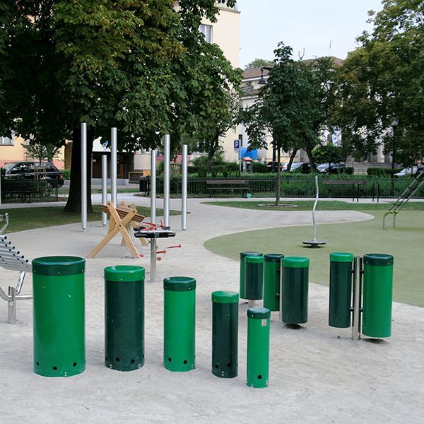 large outdoor drums, xylophones, chimes and marimba in empty playground