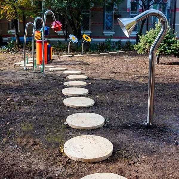 Image of the talk tube and outdoor instruments at the sensory park in at the Prof. Dr. Alexandru Obregia Psychiatric Hospital in Bucharest 