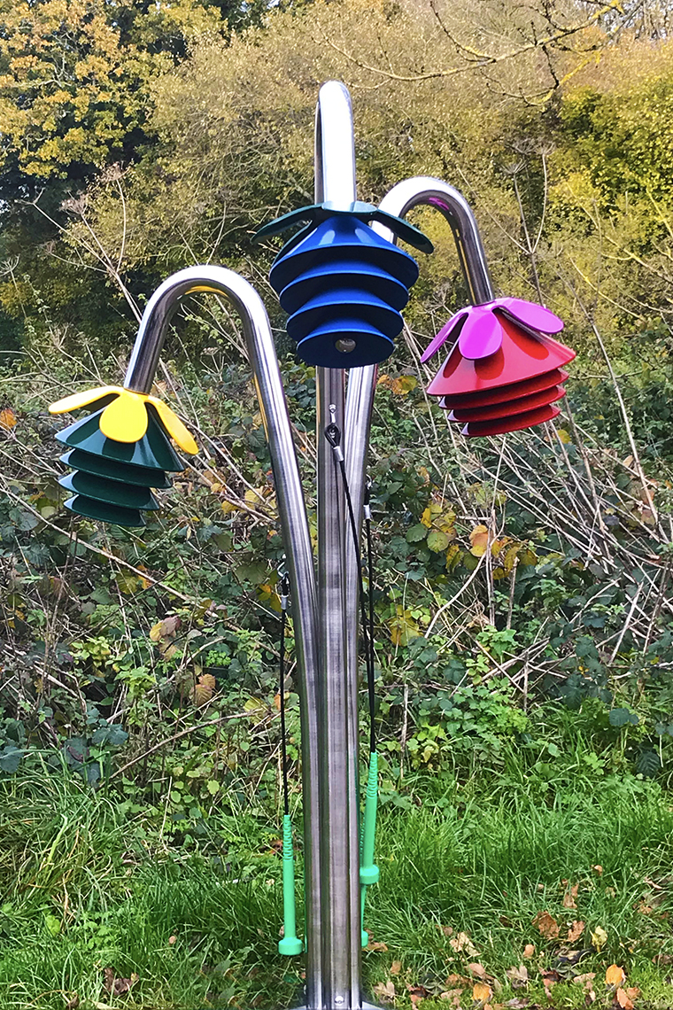 a bunch of harmony bells outdoor musical flowers for sensory gardens, parks and playgrounds 