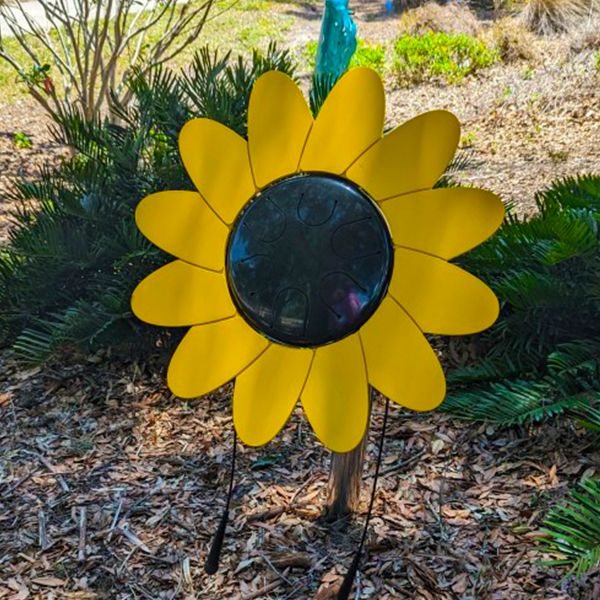 a large outdoor drum shaped like a sunflower