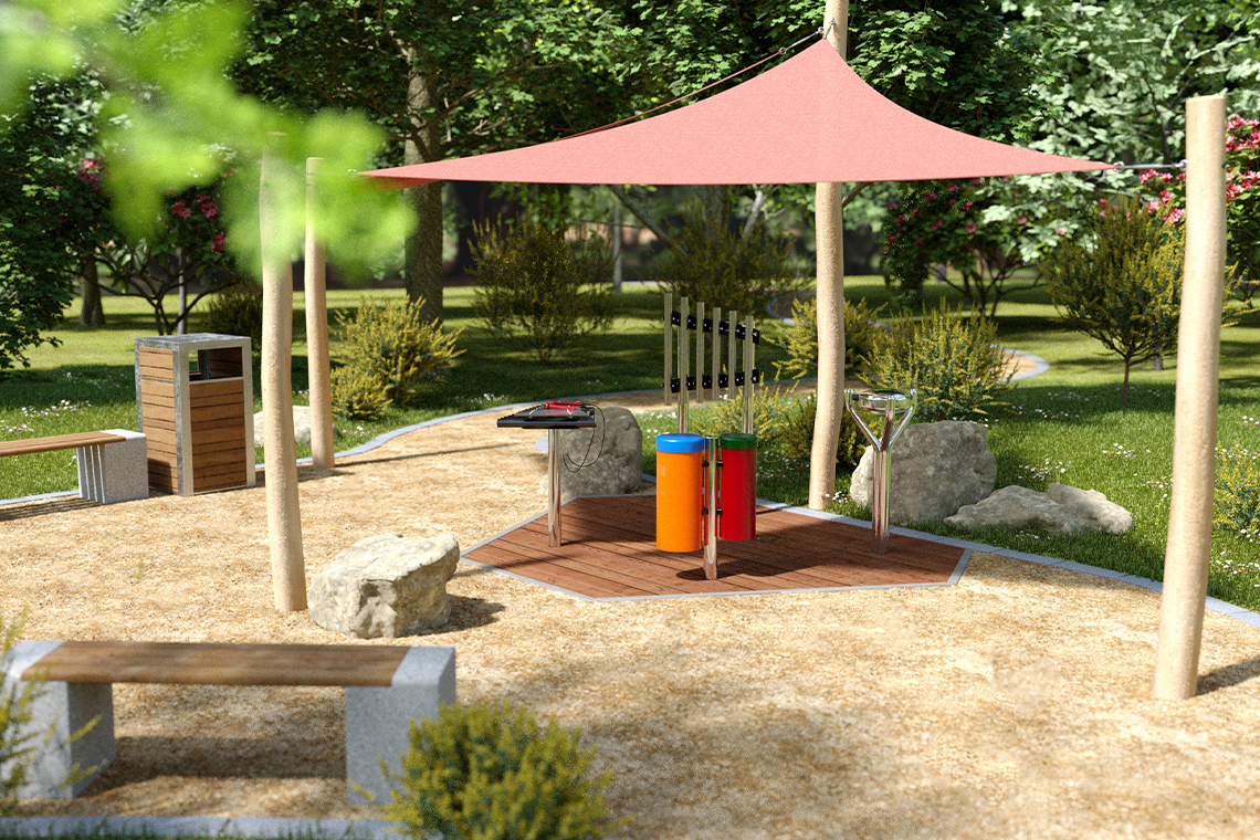 Colorful outdoor music station with a red shade sail, xylophone, and cylindrical drums, set in a lush garden path.