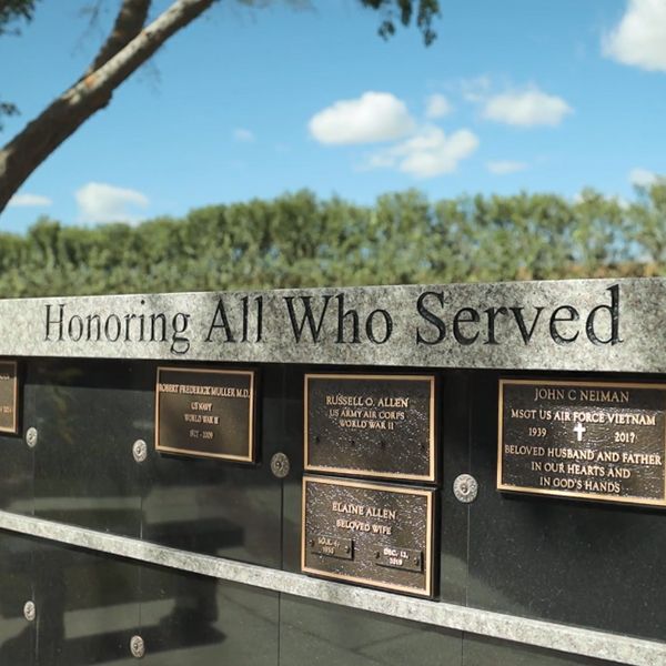 Honoring All Who Served Wall of Plaques at the Hansen Memorial Garden