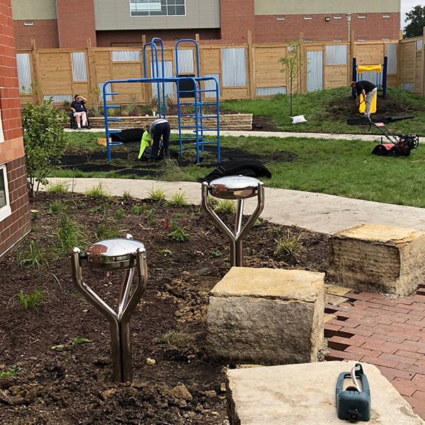 work being carried out in the sensory garden at the Iowa Women's Prison with two stainless steel tongue drums 