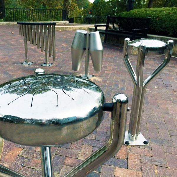 stainless steel babel drum and tubular bell chimes in a musical play park