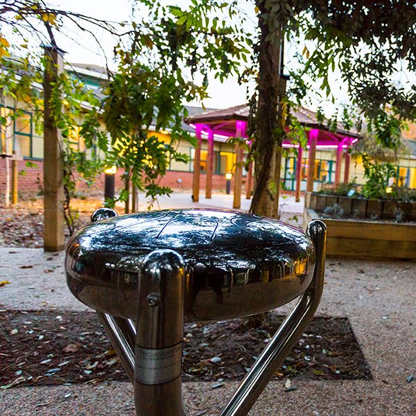 a stainless steel tongue drum in the sensory garden at aldeburgh hospital