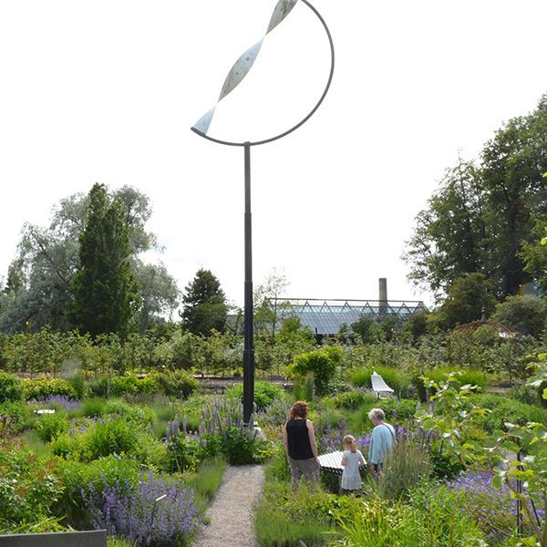 sensory garden in castle grounds with large outdoor musical instruments amongst plants