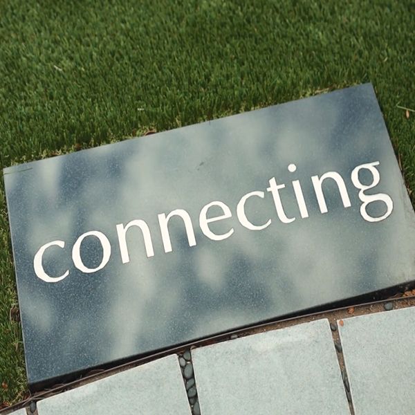 the word connecting in a paved circular path