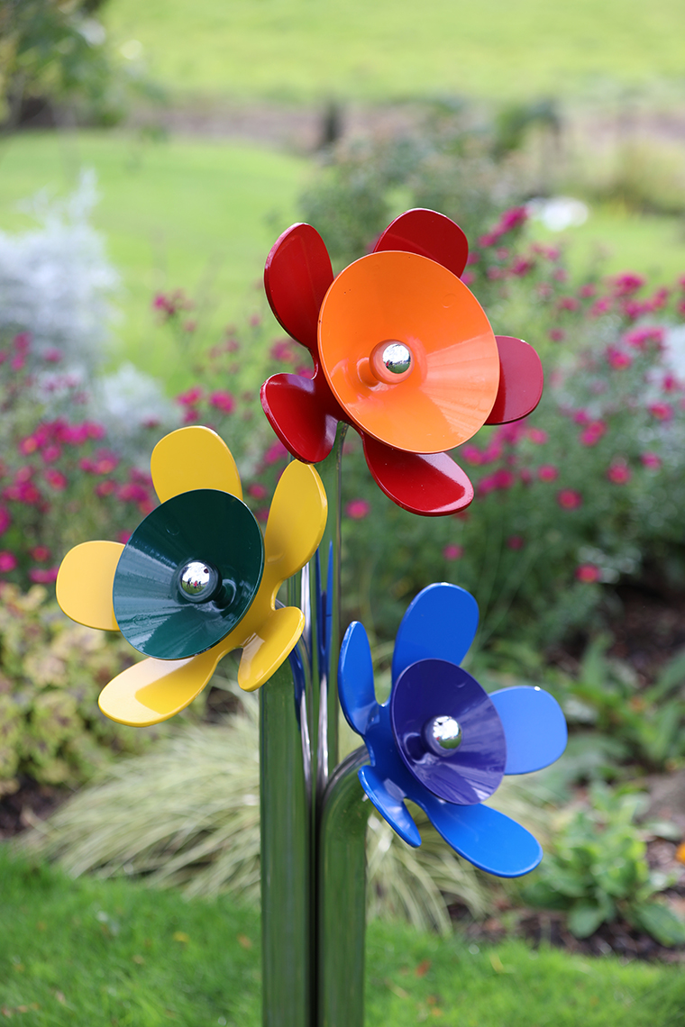 A posy of three outdoor musical flowers for sensory gardens, parks and playgrounds