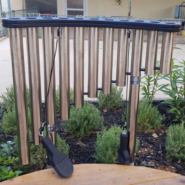 Handpipes - a stainless steel outdoor musical pipe instrument played with the hands in the musical playground at Kibbutz Magal