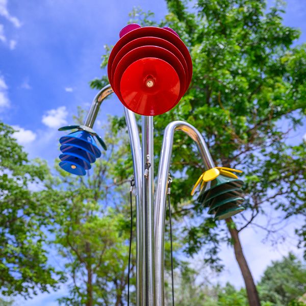 photo of an outdoor musical instrument shaped like flowers