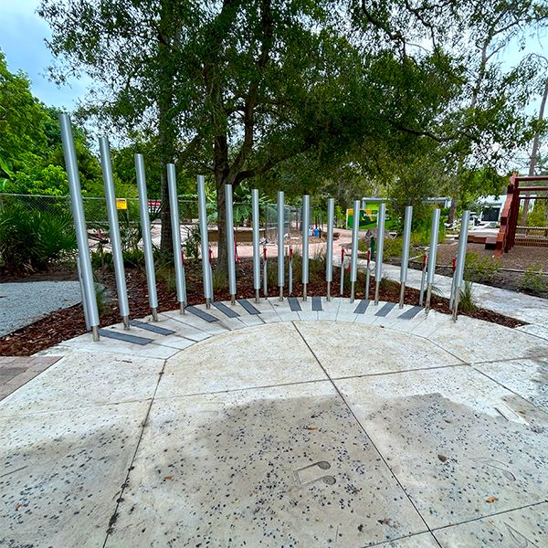 a large set of silver outdoor musical chimes in the Florida Botanical Gardens