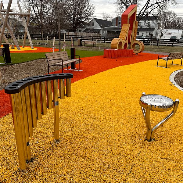 stainless steel outdoor musical instruments in a playground in Lousville