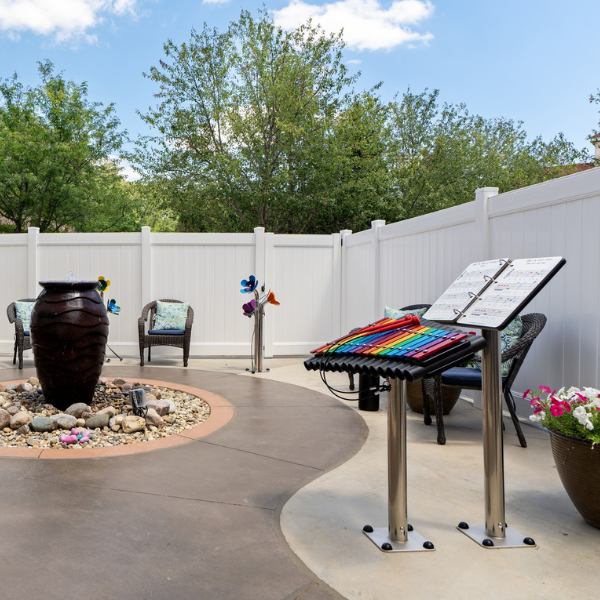 outdoor musical instruments including a mulitcolored xylophone and outdoor musical flowers