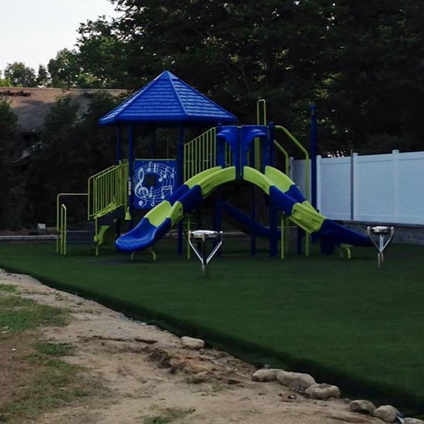 Outdoor stainless steel tongue drum shown in new children's play area