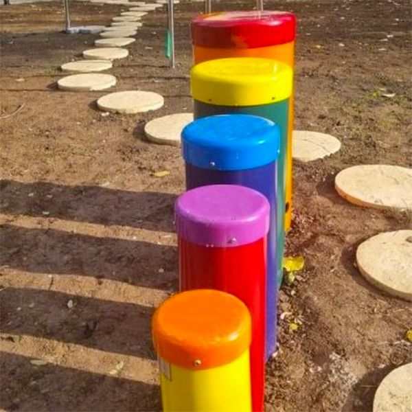 Image of outdoor rainbow drums at the sensory park in at the Prof. Dr. Alexandru Obregia Psychiatric Hospital in Bucharest 