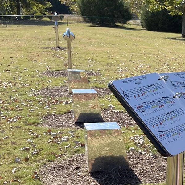 Stainless Steel Sit on Cajon Drums in the East Garner Elementary School Music Garden