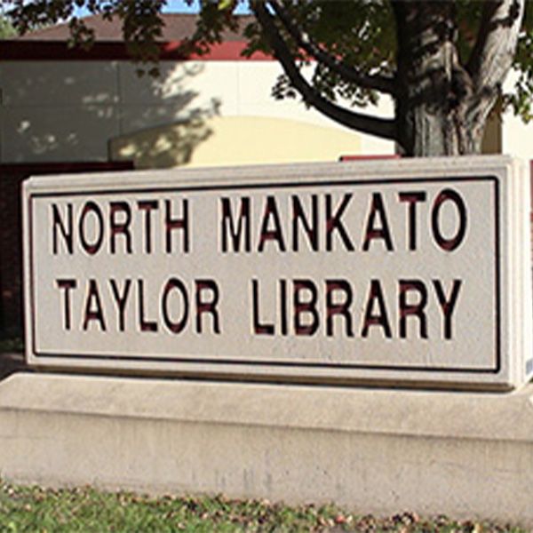 sign outside the north mankato taylor library music garden