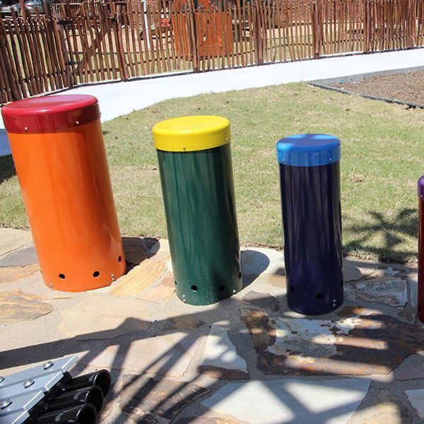 colourful outdoor drums in a small playground