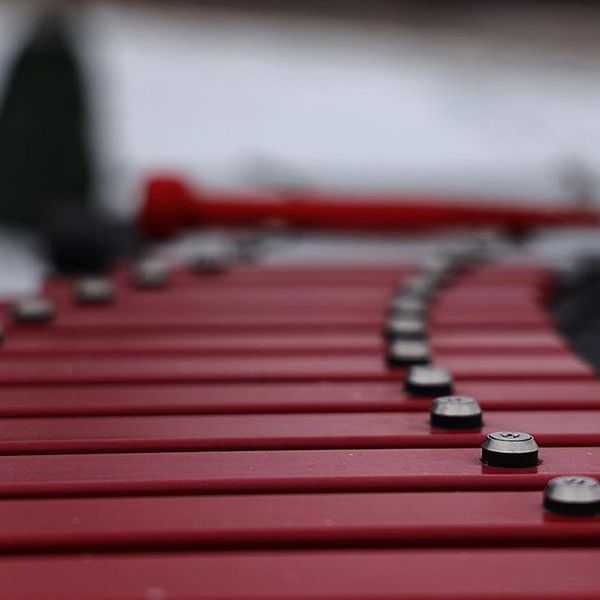 close up image of pink GRP notes on an outdoor xylophone in the Quinterra legacy garden calgary