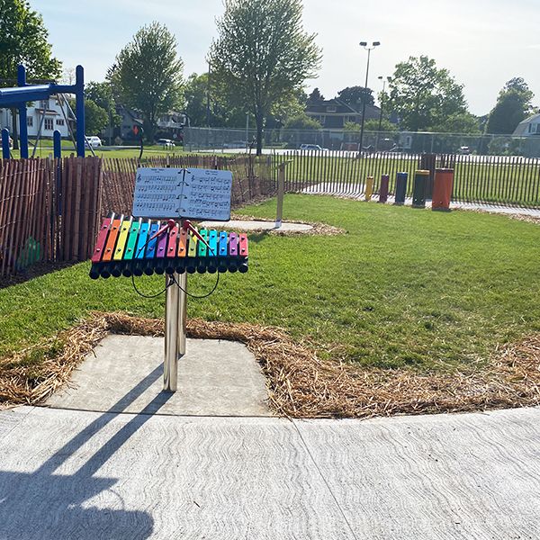 a large outdoor xylophone in a park