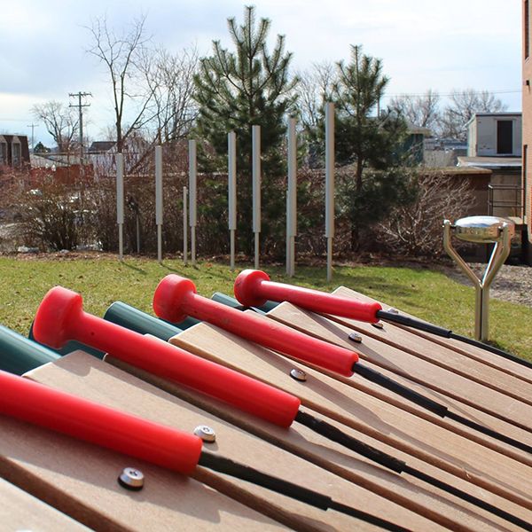 the wooden notes of the outdoor marimba xylophone in the dino garden liverpool public library new york