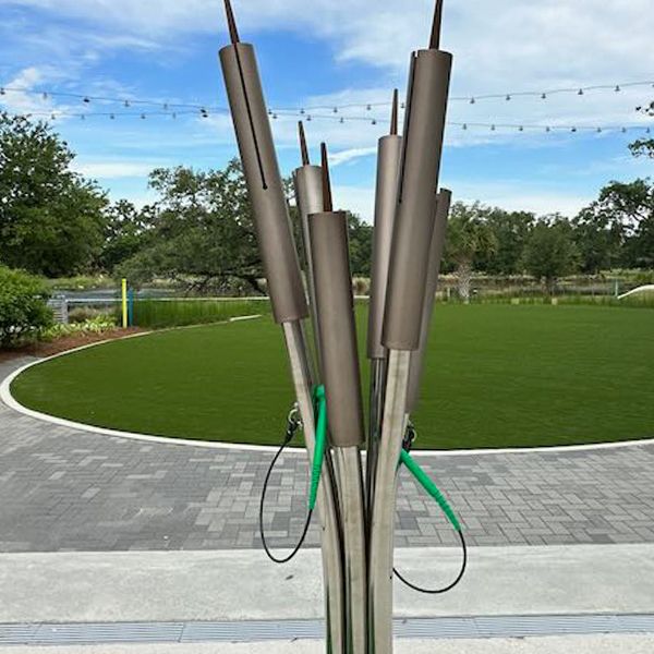 outdoor musical chimes shaped like cattails at the Louisiana Children's Museum