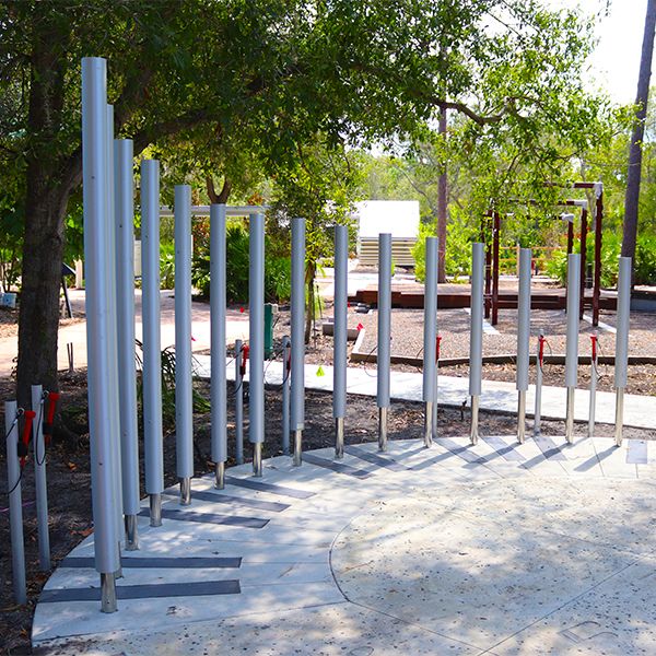 a large set of silver outdoor musical chimes in the Florida Botanical Gardens