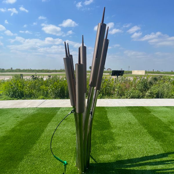 an outdoor musical instrument made to look like cattails in the Kansas Wetlands Center new musical garden