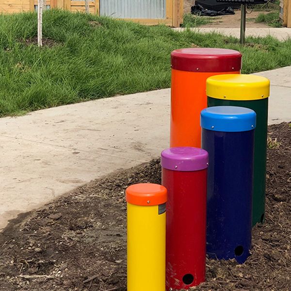 Outdoor colourful Rainbow Samba Drums in the Iowa Prison Garden 